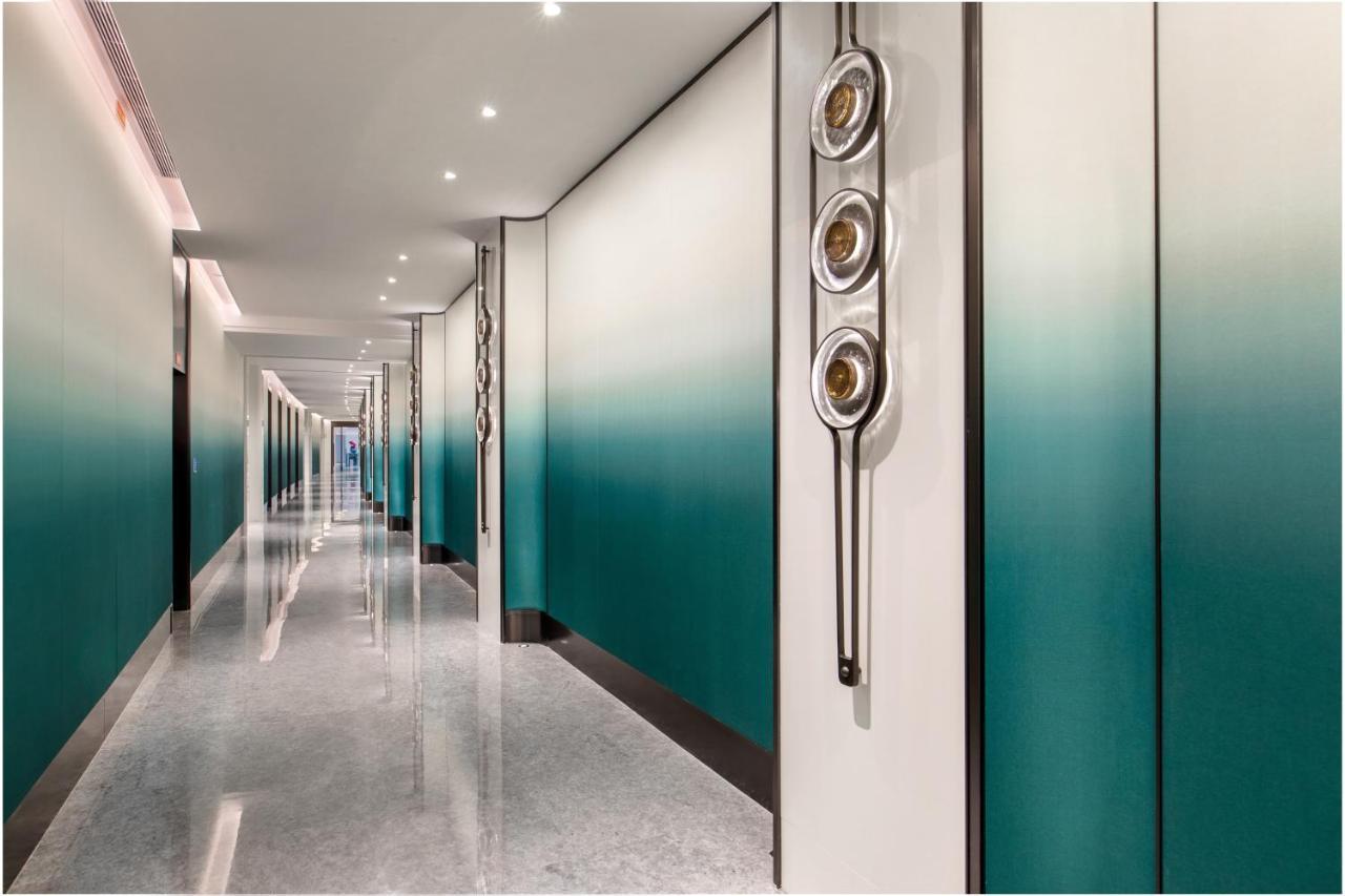 Xiamen International Seaside Hotel -Hotel Corridor Leads To The Stone Exhibition Hall Exteriér fotografie