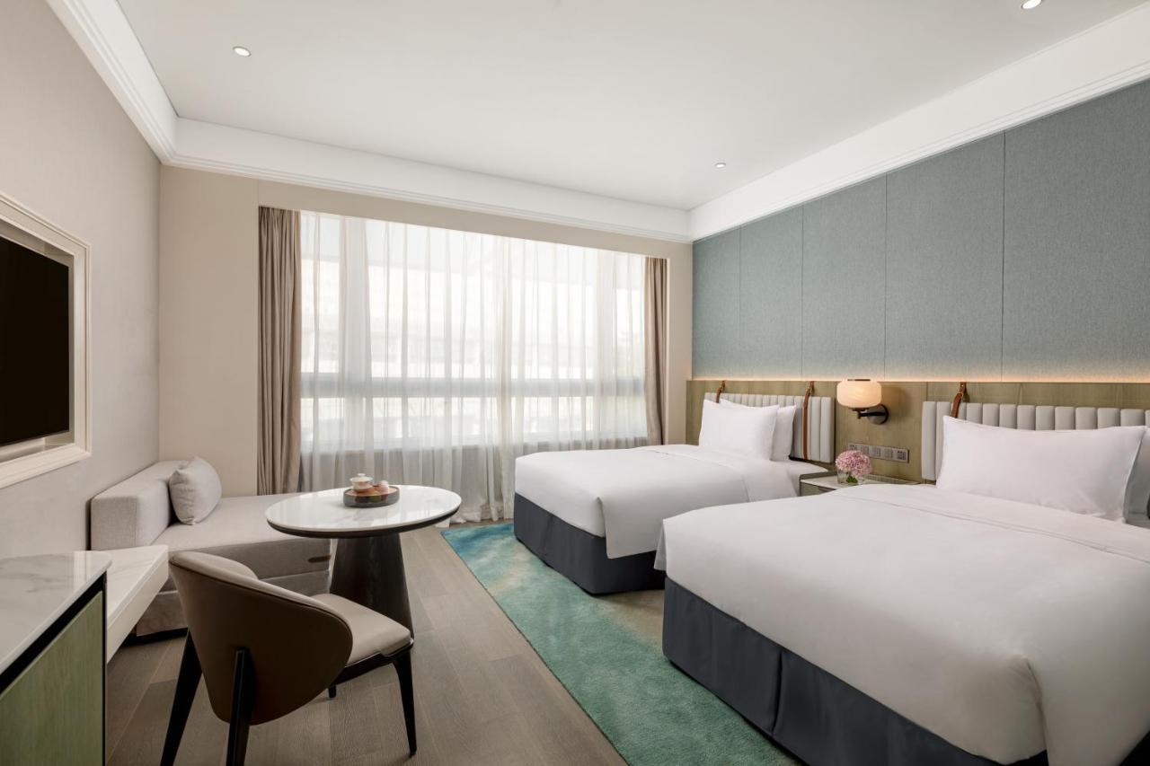 Xiamen International Seaside Hotel -Hotel Corridor Leads To The Stone Exhibition Hall Pokoj fotografie